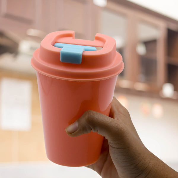 Portable plastic coffee cup, suitable for home, office, or travel, with a motivational design.