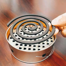 Metal mosquito coil holder for outdoor use.